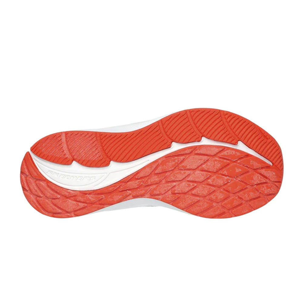 Bottom view of a pair of Skechers Elite Sport Charcoal/Red - Kids athletic shoe soles with textured designs for traction, featuring a flexible rubber outsole.