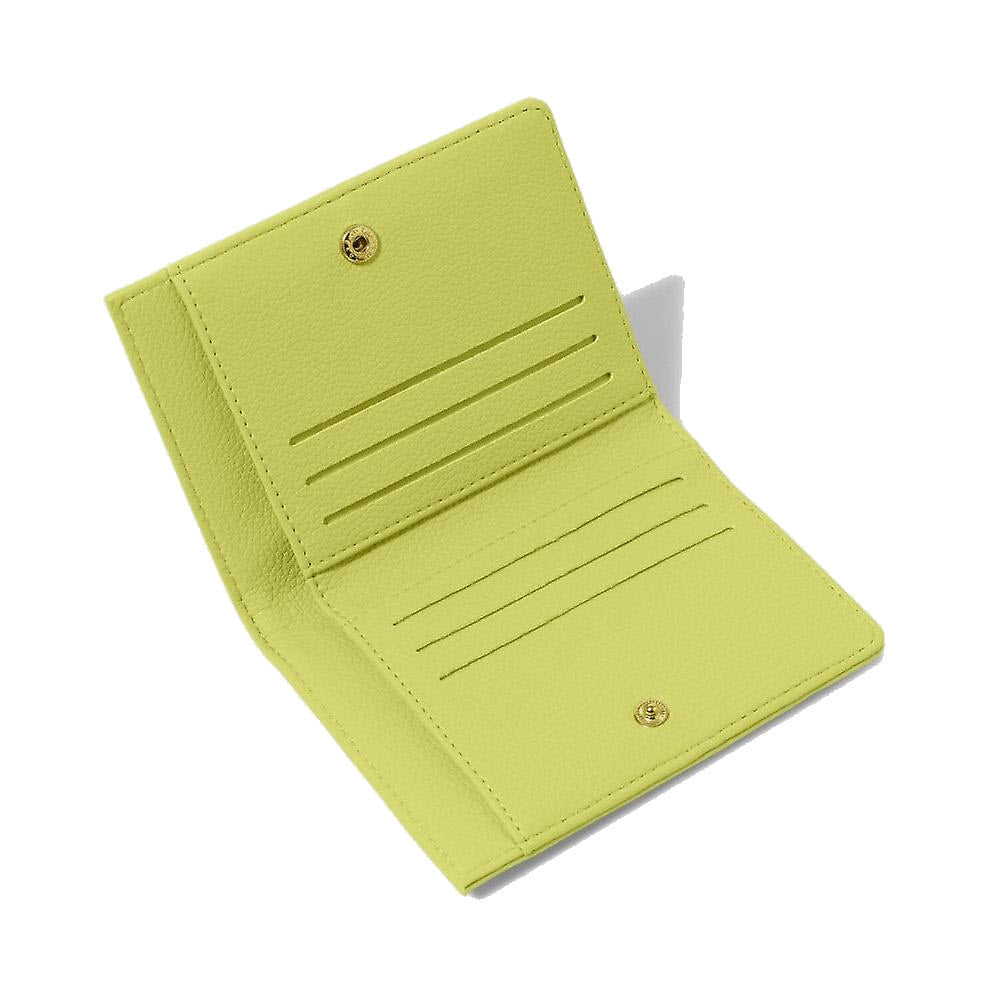Katie Loxton Jayde wallet lime open, displaying card slots, isolated on a white background.