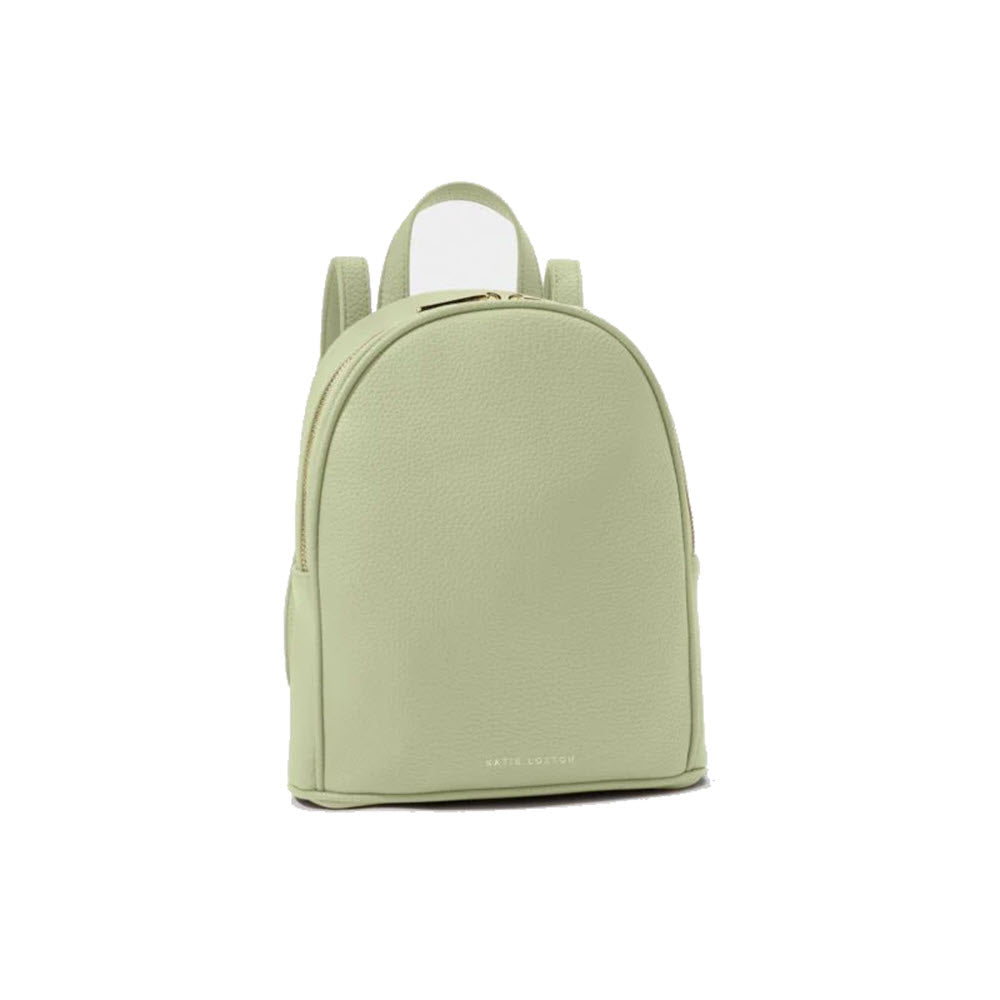 A KATIE LOXTON CLEO BACKPACK SOFT SAGE with a minimalist design and the name &quot;Katie Loxton&quot; embossed at the bottom.
