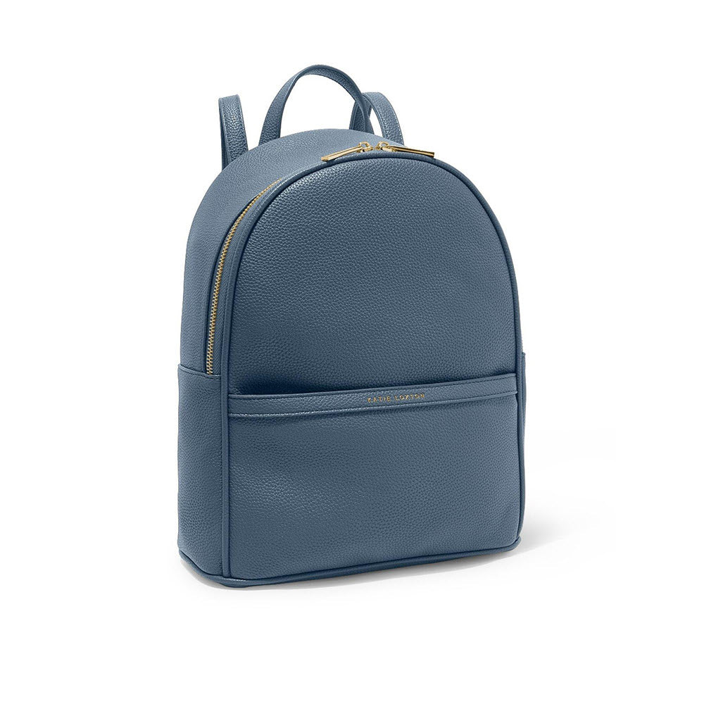 Katie Loxton Cleo backpack navy with a gold zipper and a small front pocket, isolated on a white background.