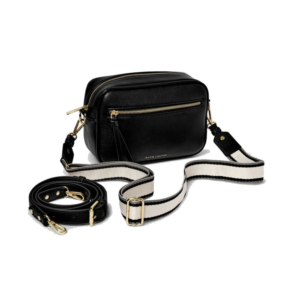 A Katie Loxton Hallie Crossbody Black with a gold zipper and a detachable striped shoulder strap.
