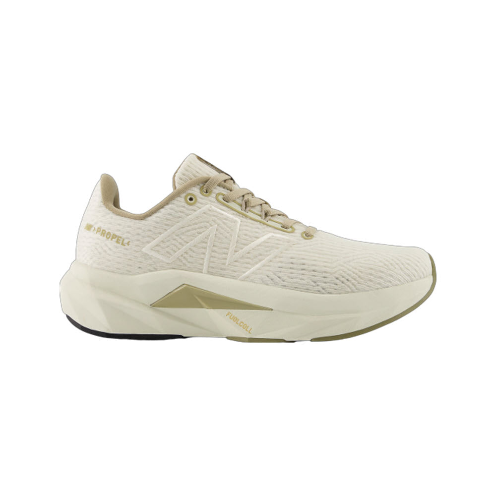 The New Balance Propel V5 in Linen/Gold Metallic/Stoneware for women features a textured upper, lace-up closure, and thick cushioned sole—ideal for athletic footwear collections.