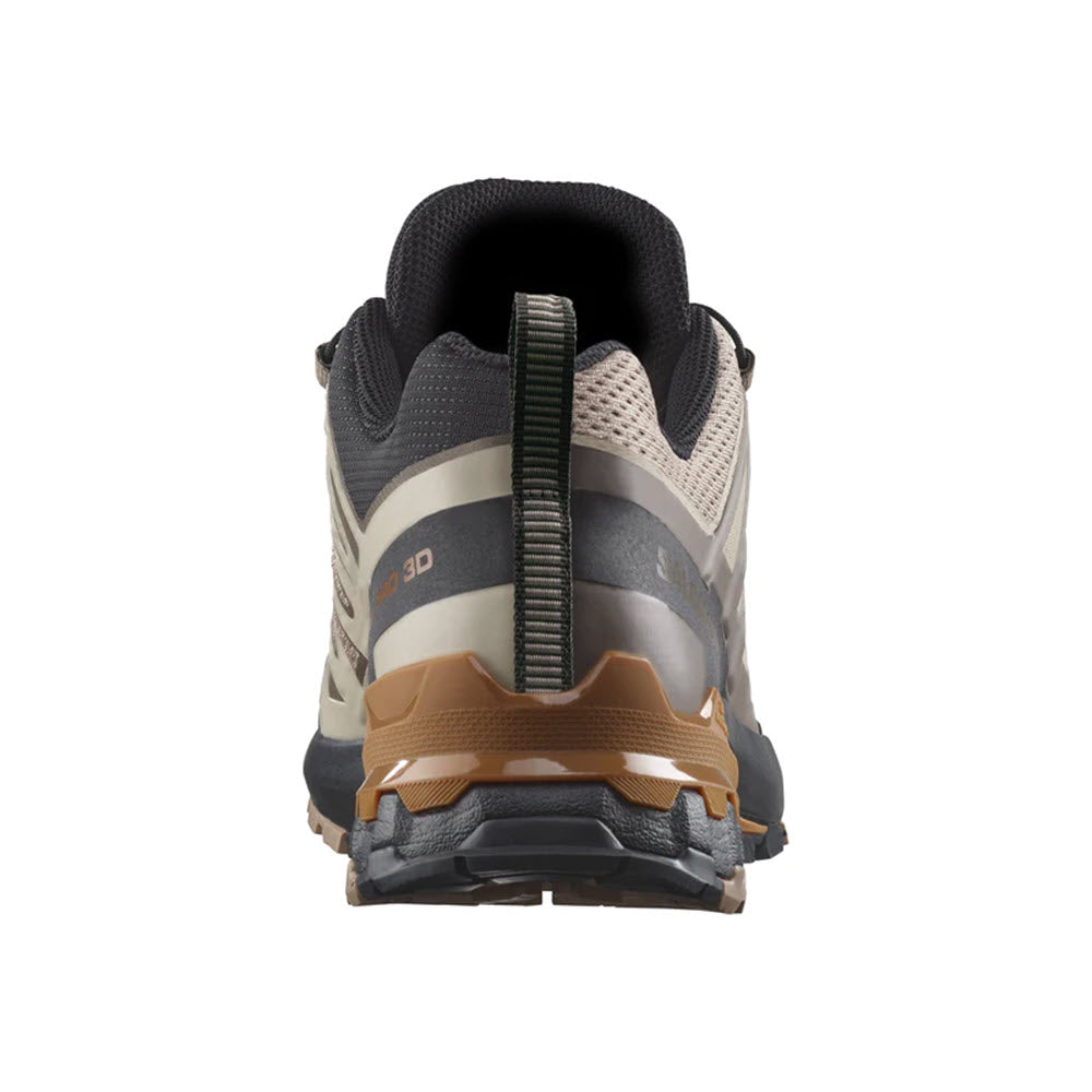 Rear view of a modern trail running shoe, the Salomon XA PRO 3D V9, with a gray, beige, and black color scheme, featuring rugged All Terrain Contagrip tread.