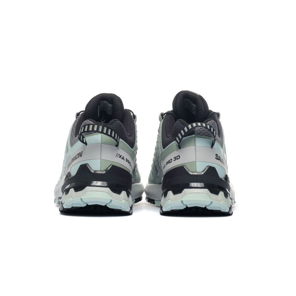 A pair of Salomon XA Pro 3D V9 Quiet Shade/Lily Pad/Blue Haze trail running shoes, viewed from the back on a white background.