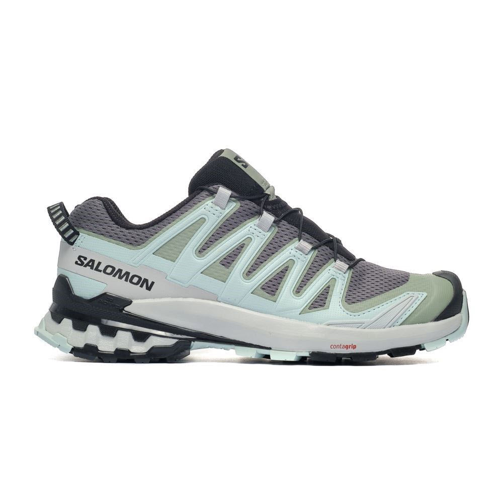 A side view of a Salomon SALOMON XA PRO 3D V9 QUIET SHADE/LILY PAD/BLUE HAZE - WOMENS hiking shoe with gray and white tones, featuring rugged grip sole and breathable mesh panels.