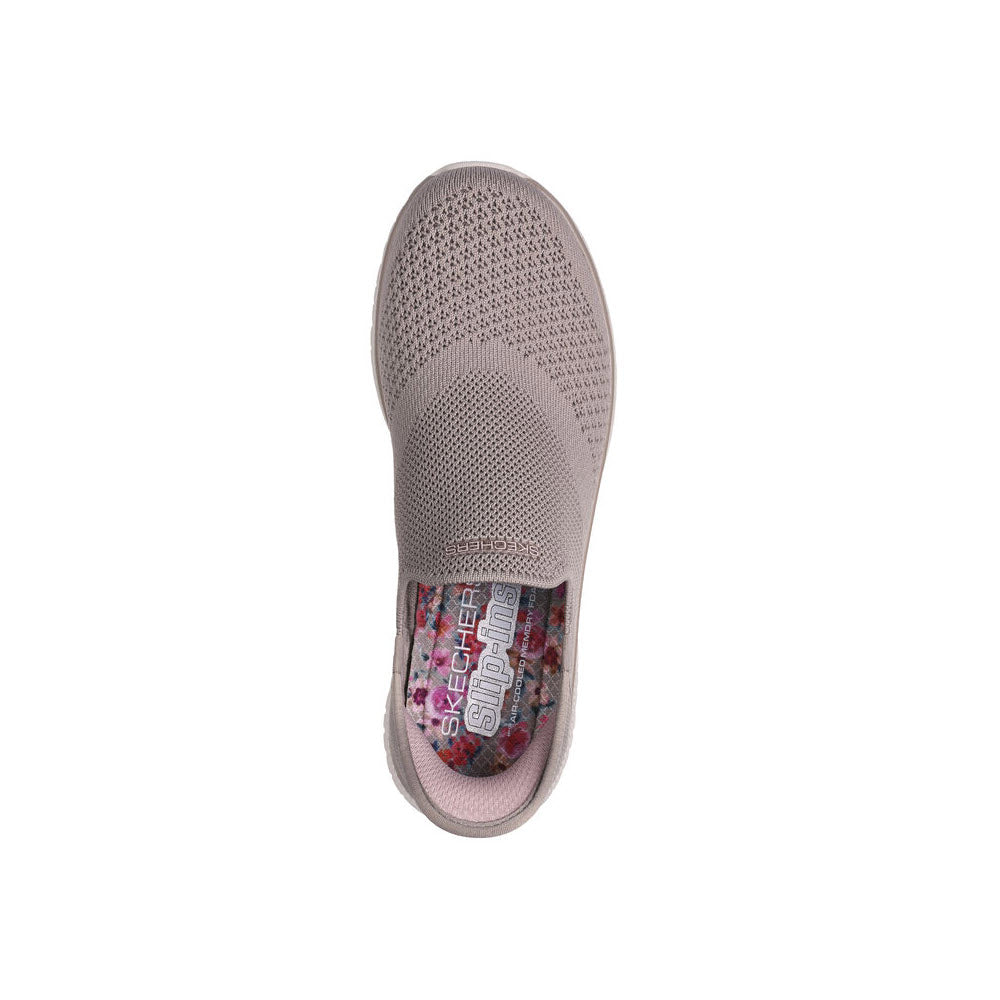 Top view of a single Skechers Virtue Sleek Taupe slip-in sneaker featuring an Air-Cooled Memory Foam insole and a visible floral pattern inside.