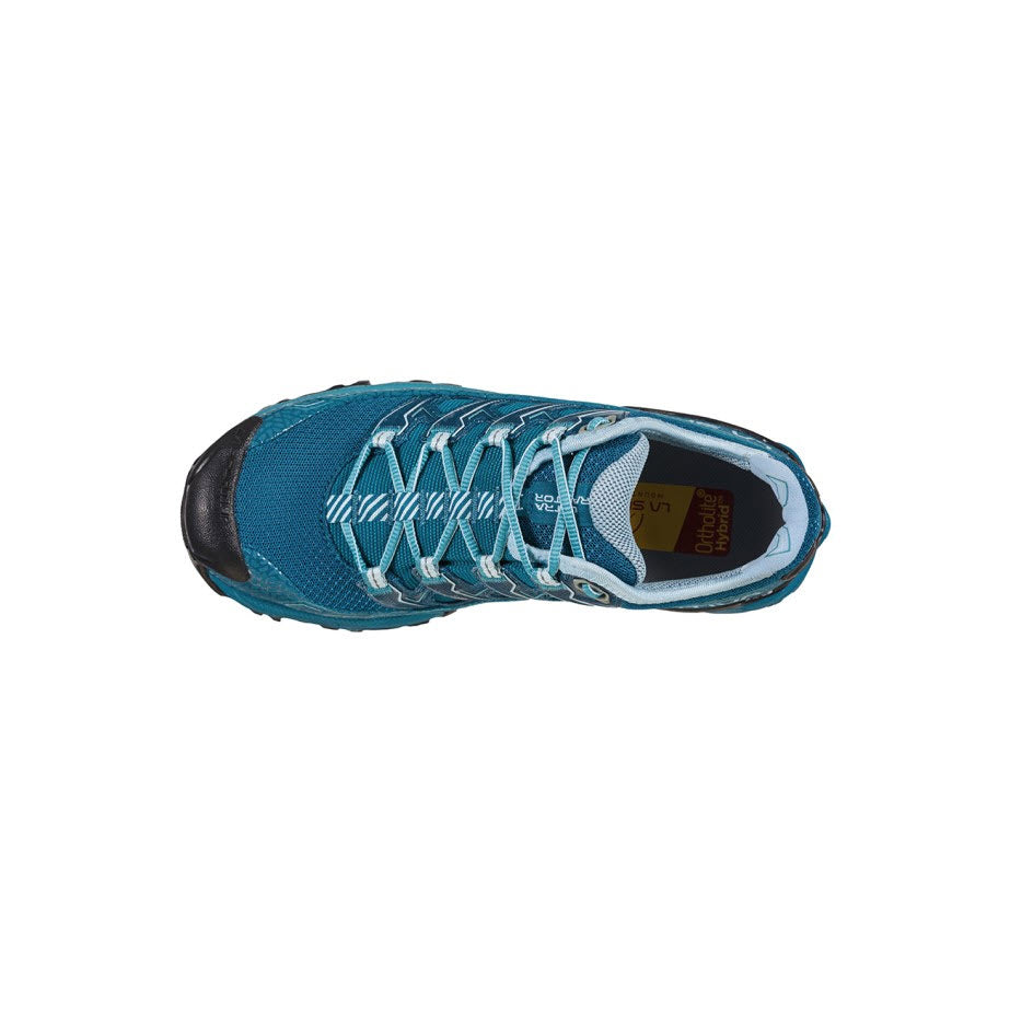 Top view of a single turquoise and black La Sportiva Ultra Raptor II trail running shoe with intricate lacing and a visible inner label.