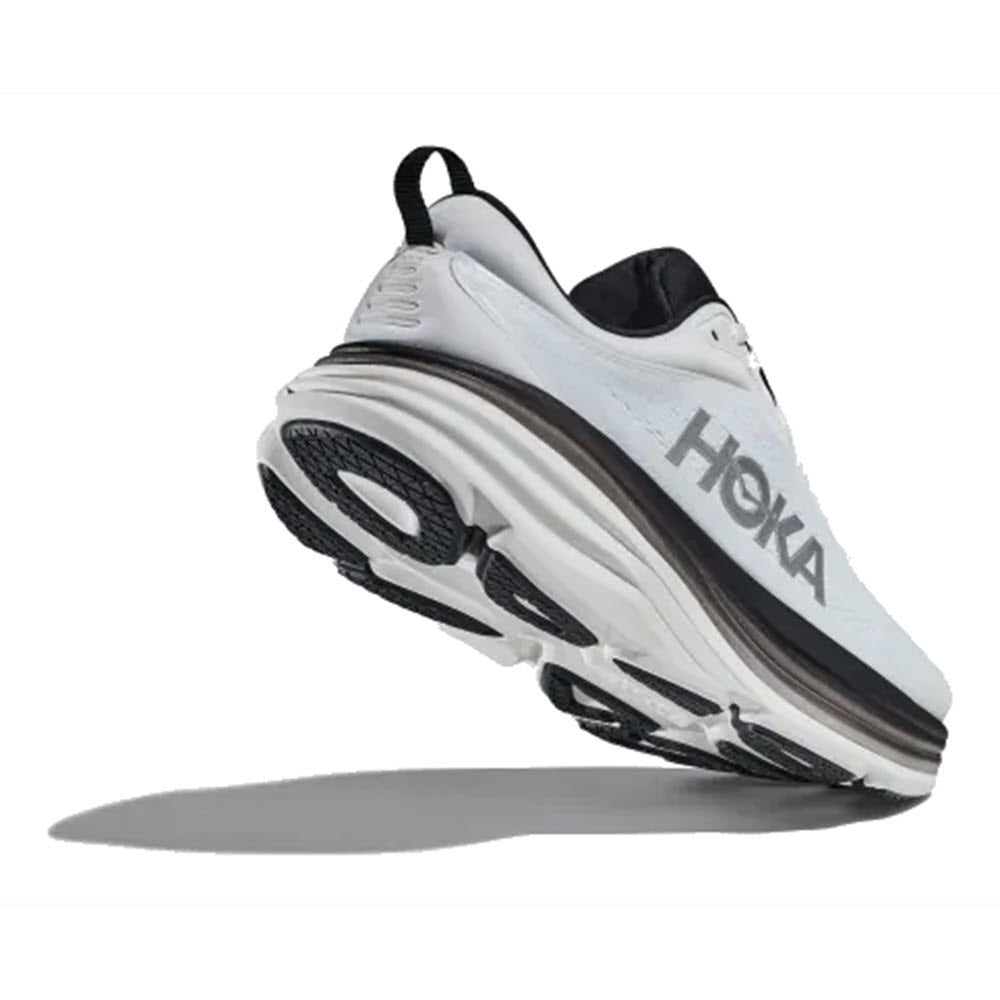 Single white HOKA Bondi 8 running shoe with black and gray details, viewed from the side against a white background.