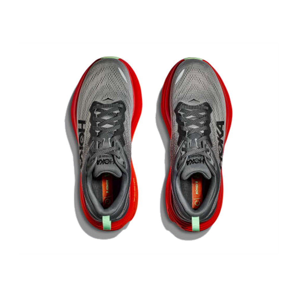 A pair of HOKA Bondi 8 Castlerock/Flame running shoes with grey uppers and bright red soles, viewed from above.