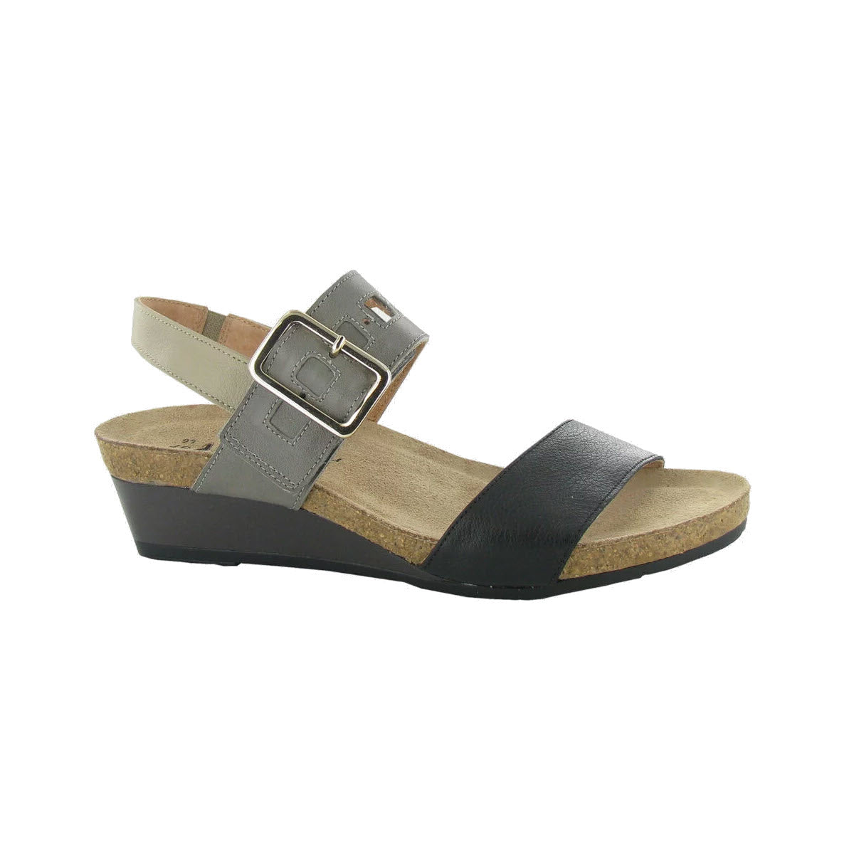 Black and gray Naot women&#39;s wedge sandals with a hook and loop closure, displayed on a white background.