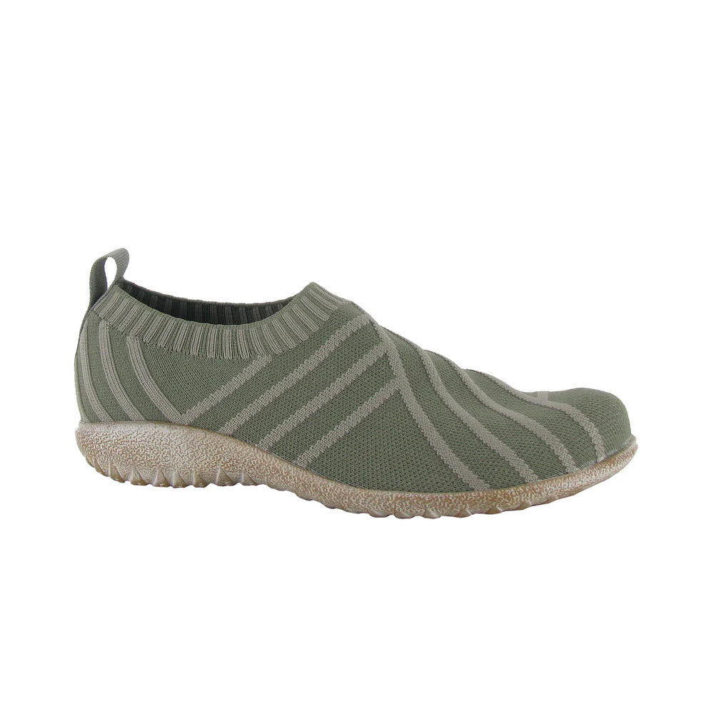 Side view of a Naot Okahu Sage Knit slip-on sneaker with a textured sole, displayed on a white background.