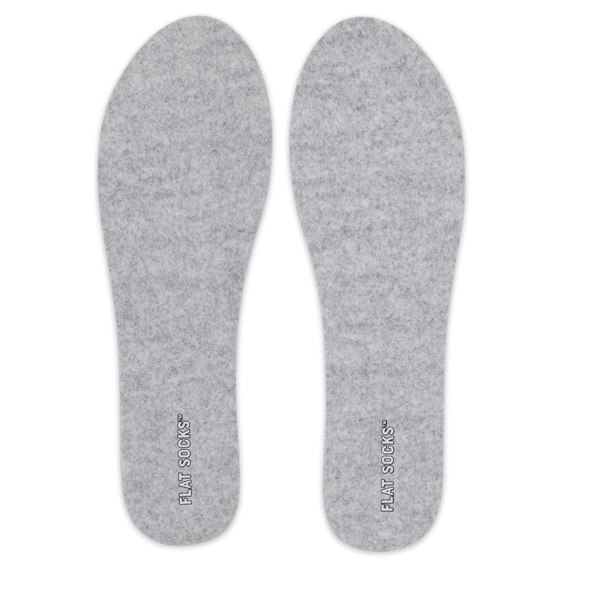 A pair of FLAT SOCKS LIGHT GREY MICRO WOOL - WOMENS with the text &quot;felt so soft soles&quot; printed on them, designed for sock-free use, displayed on a white background by FLAT SOCKS.