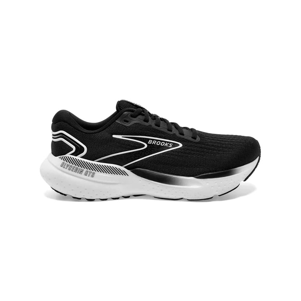 A black and white women's Brooks Glycerin GTS 21 running shoe on a white background, featuring a dynamic white sole design and the Brooks logo on the side.