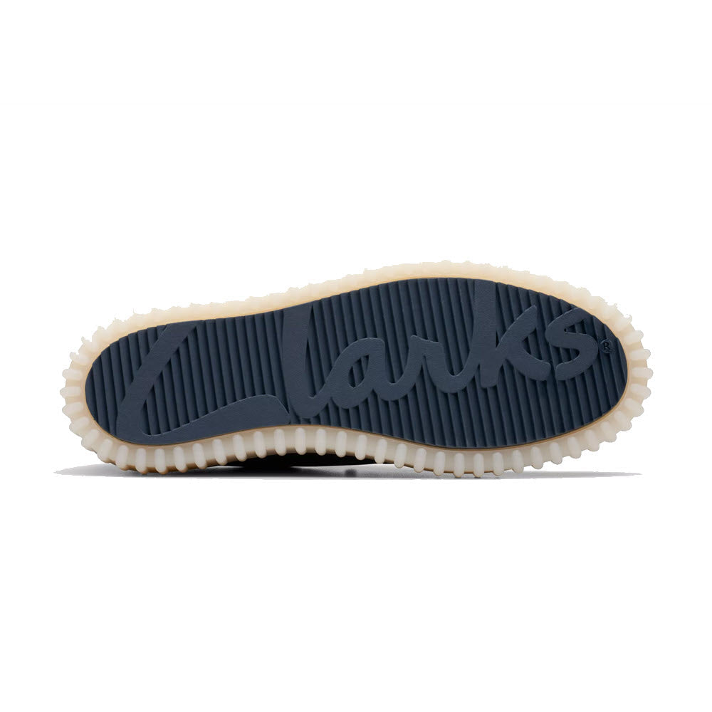 The sole of a Clarks Torhill Lo shoe with ribbed outsole and the brand name embossed in the center, shown against a white background.