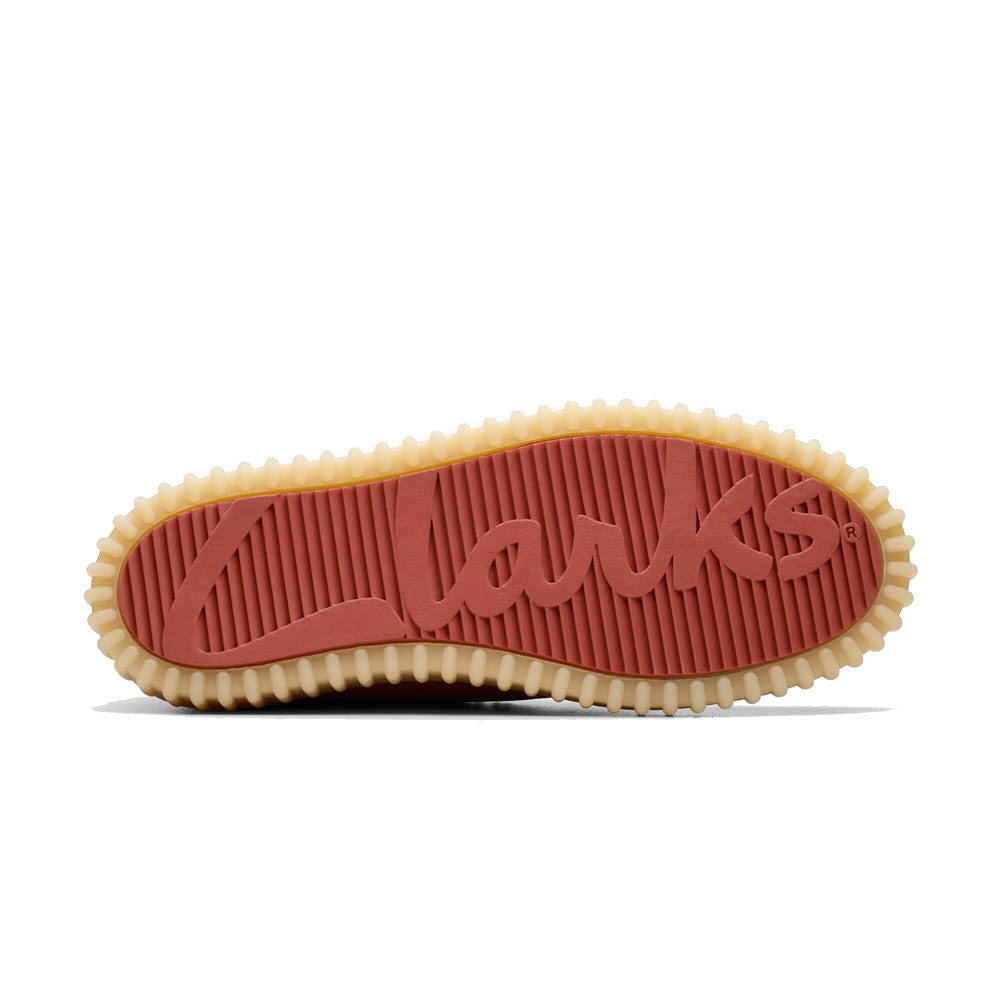 Bottom view of a Clarks Torhill Lo Lace Leather Oxford Rust shoe sole displaying the Clarks brand name embossed in a red-orange color.