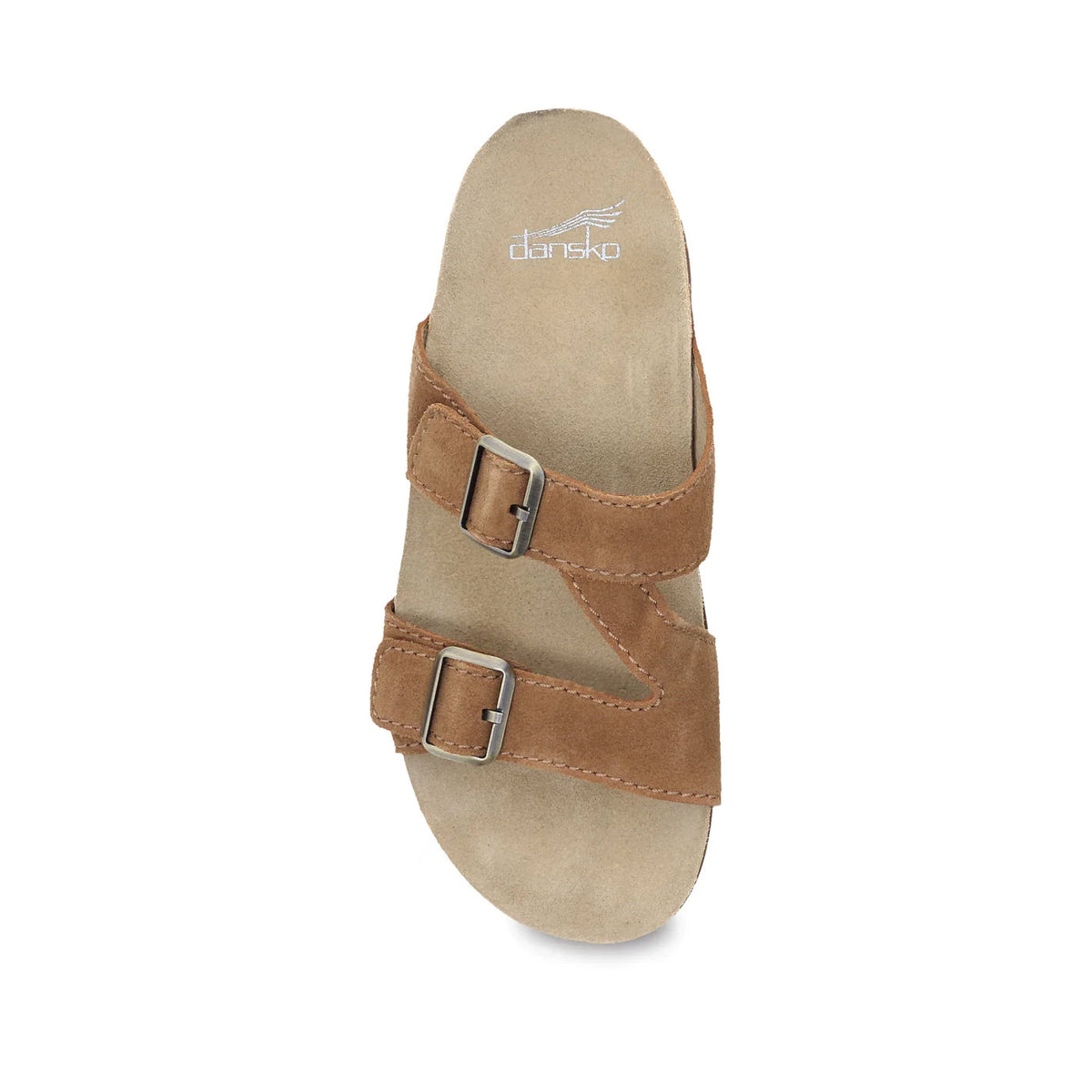 Top view of a single tan suede Dansko Dayna sandal with two adjustable straps featuring silver buckles, isolated on a white background.