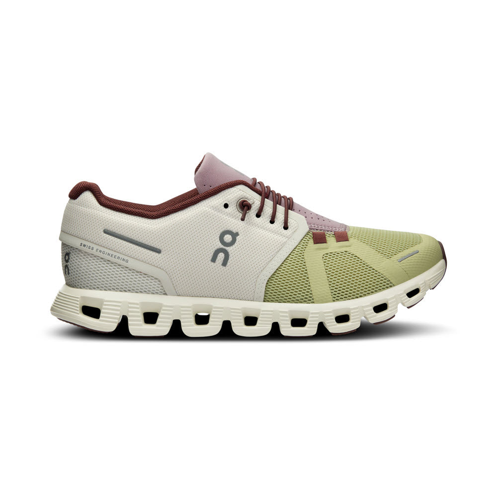 A single ON RUNNING CLOUD 5 ICE/HAZE - WOMENS athletic shoe with a unique round peg sole design for improved fit, displayed against a white background.