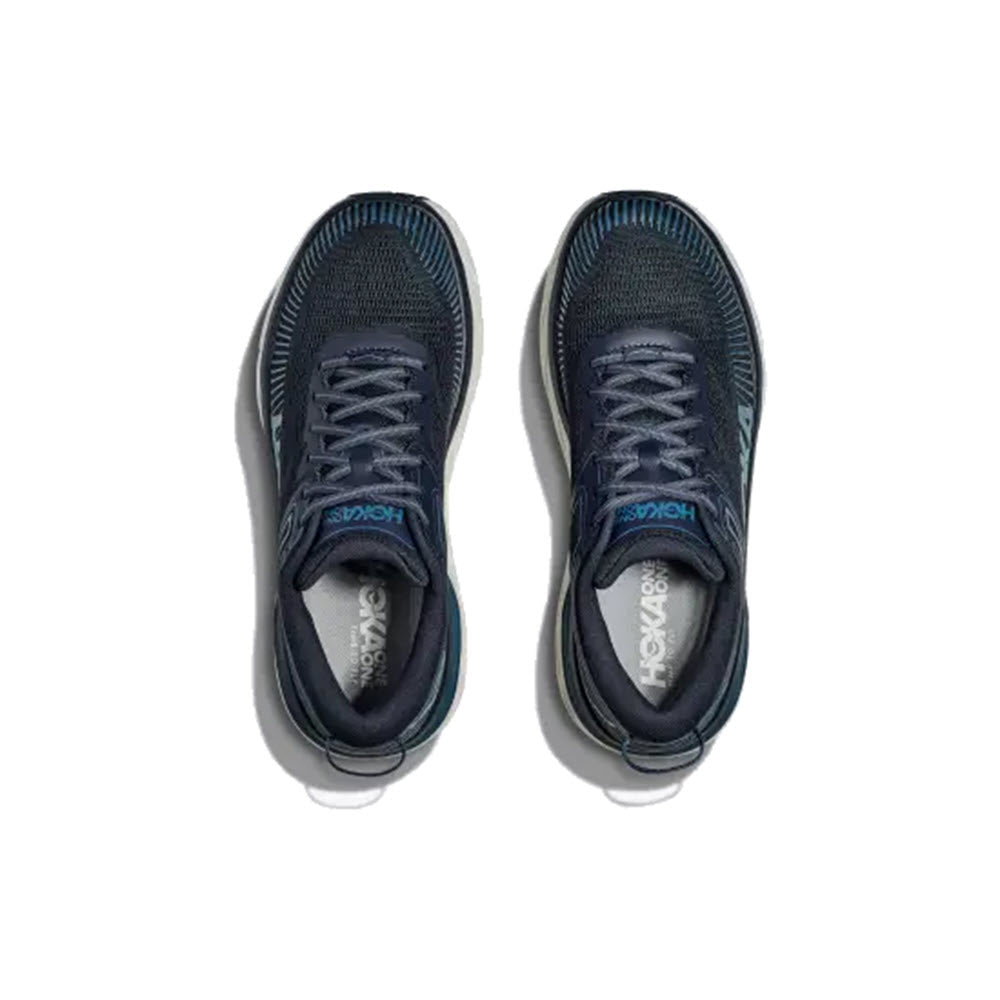A pair of navy blue Hoka Bondi 7 cushioned road shoes viewed from above on a white background.