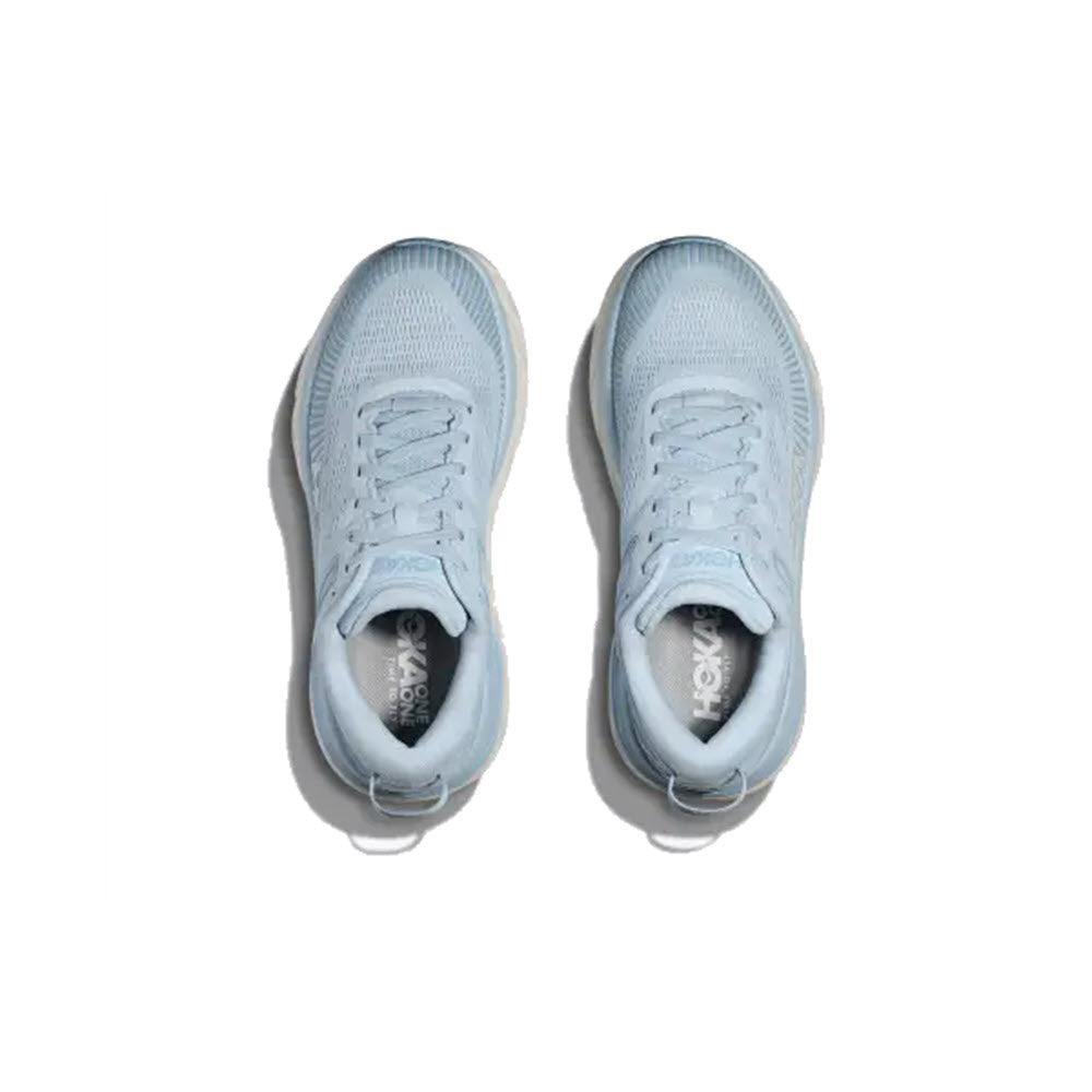 A pair of light blue HOKA Bondi 7 ICE WATER/WHITE - WOMENS running shoes viewed from above, positioned side by side on a white background.
