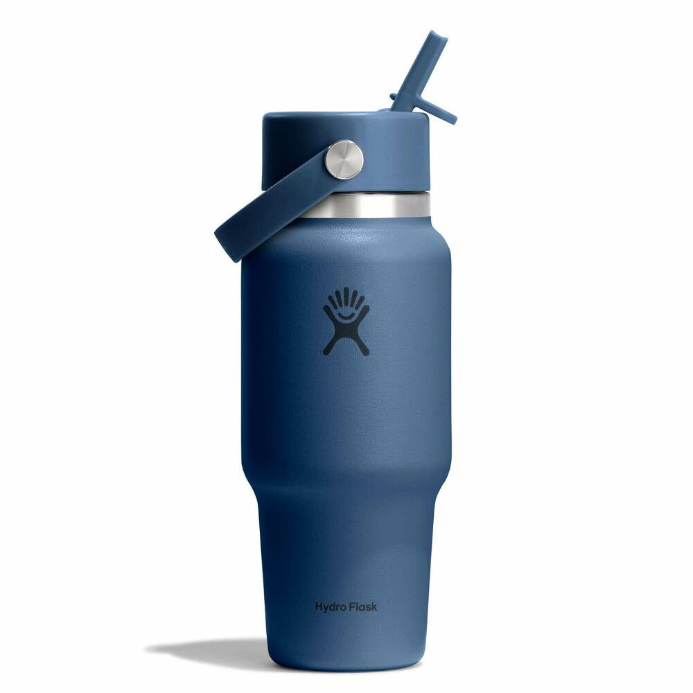A blue Hydro Flask water bottle with a handle and a closed flip straw lid, featuring the Hydro Flask logo on the front, is shown against a white background.