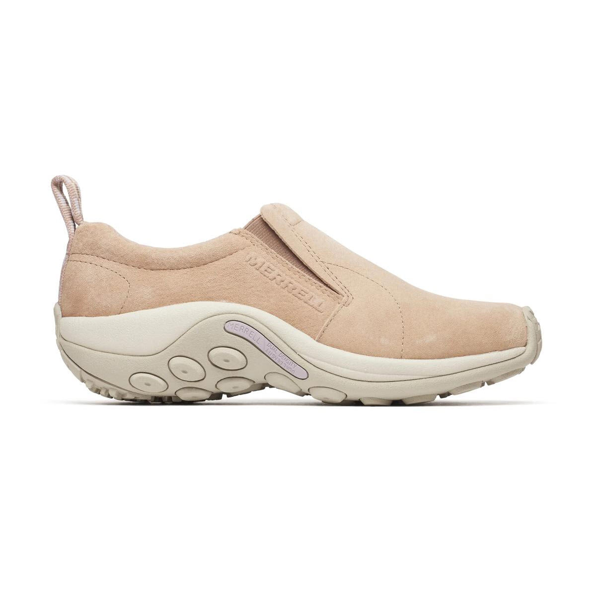A side view of a tan suede slip-on Merrell shoe with a thick, textured rubber sole and a pull tab at the back.