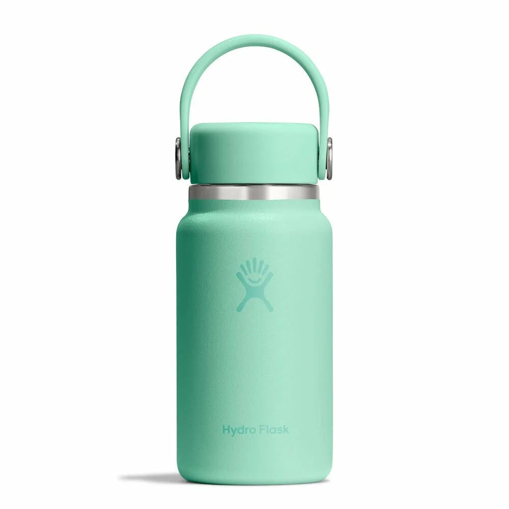 A mint green Hydro Flask water bottle with a handle on the lid, featuring the Hydro Flask logo on the front, against a plain white background.
