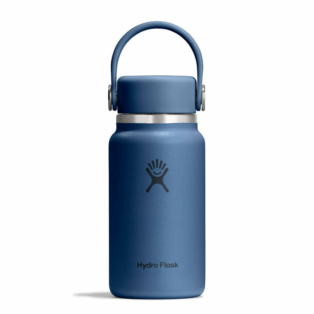 A blue Hydro Flask water bottle with a wide mouth, a carrying handle, and the Hydro Flask logo on the front, shown on a plain white background.