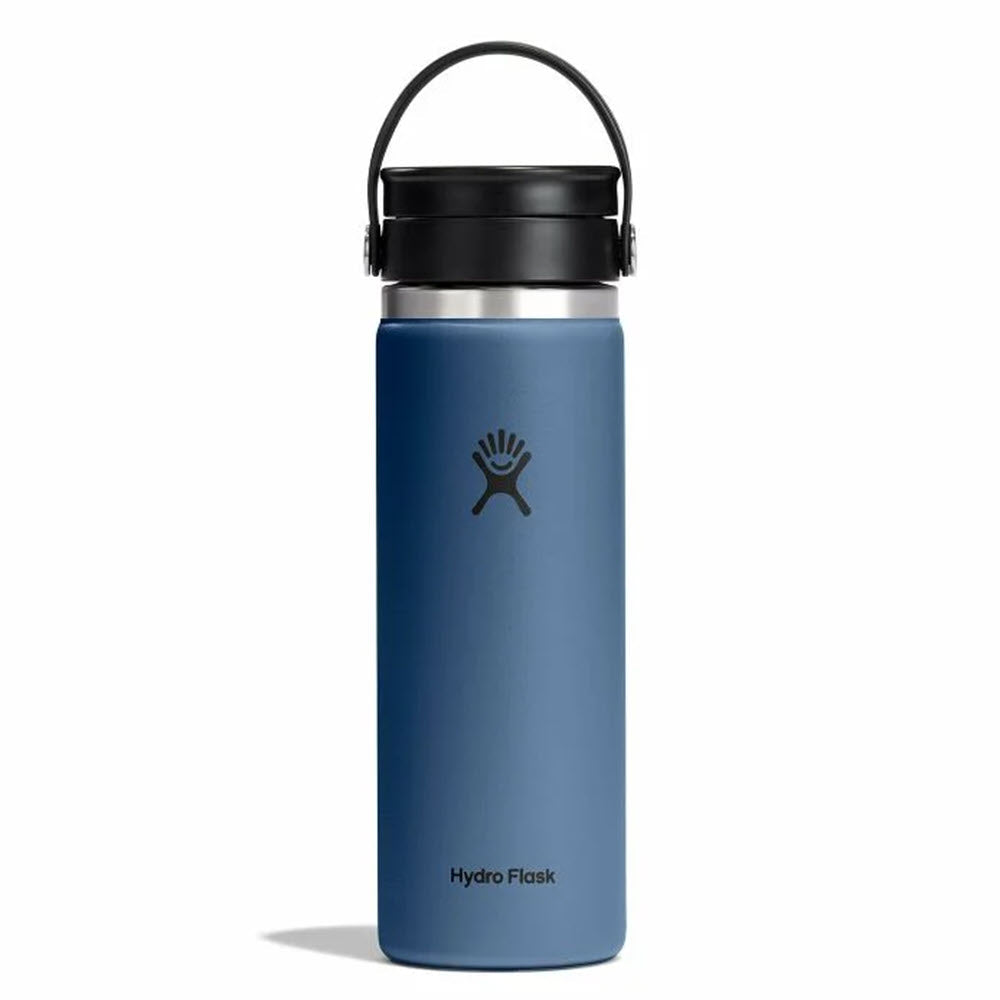 A blue Hydro Flask water bottle with a black lid and handle is standing upright against a white background. The Hydro Flask logo is visible on the front of the bottle.