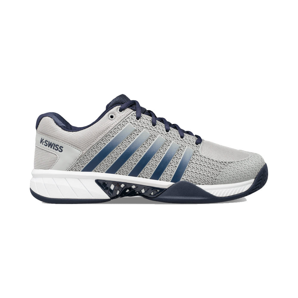A gray and white athletic sneaker with navy blue laces and accents, featuring the K-Swiss logo on the heel and striped side design.