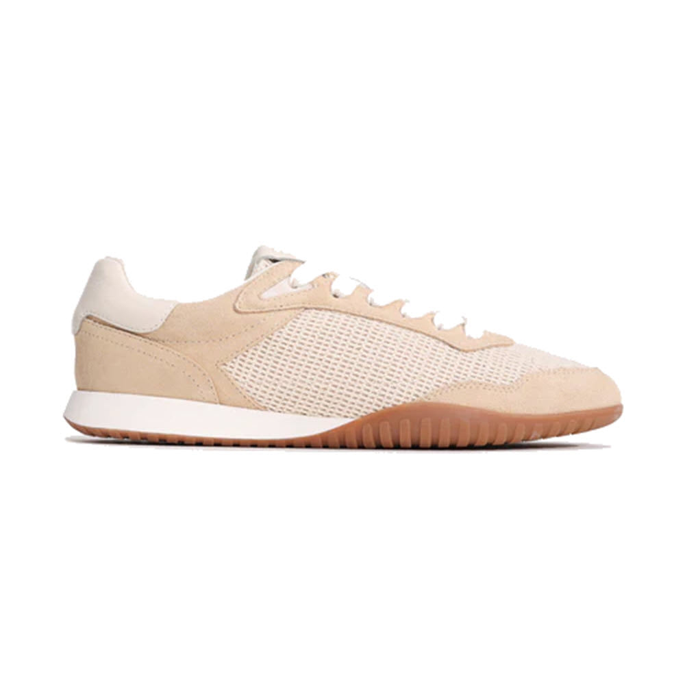 A beige and white sneaker with a suede and mesh upper, white laces, a white midsole, and a light brown rubber sole, shown in a side profile on a plain white background.