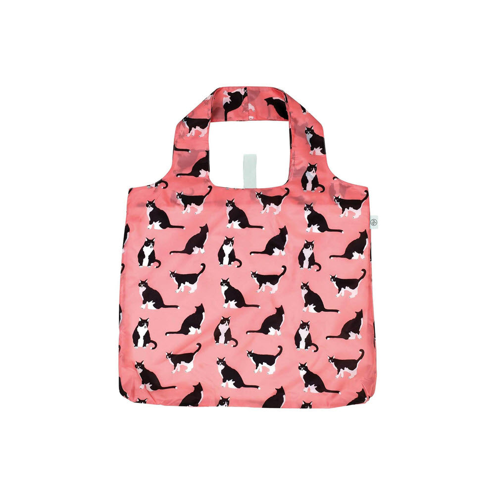 A reusable shopping bag with a pink background featuring a pattern of black and white cats in various poses.