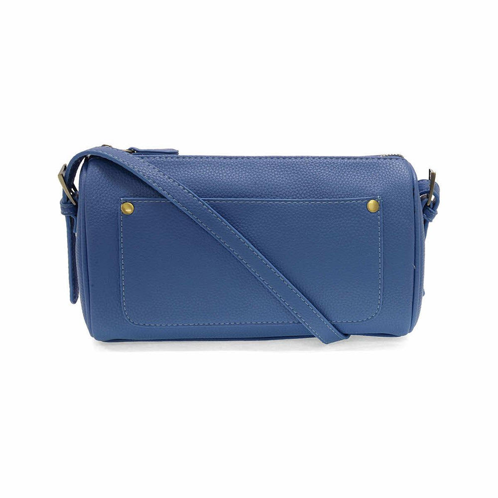 A blue leather crossbody bag with a front pocket featuring two gold rivets and an adjustable strap, displayed against a white background.