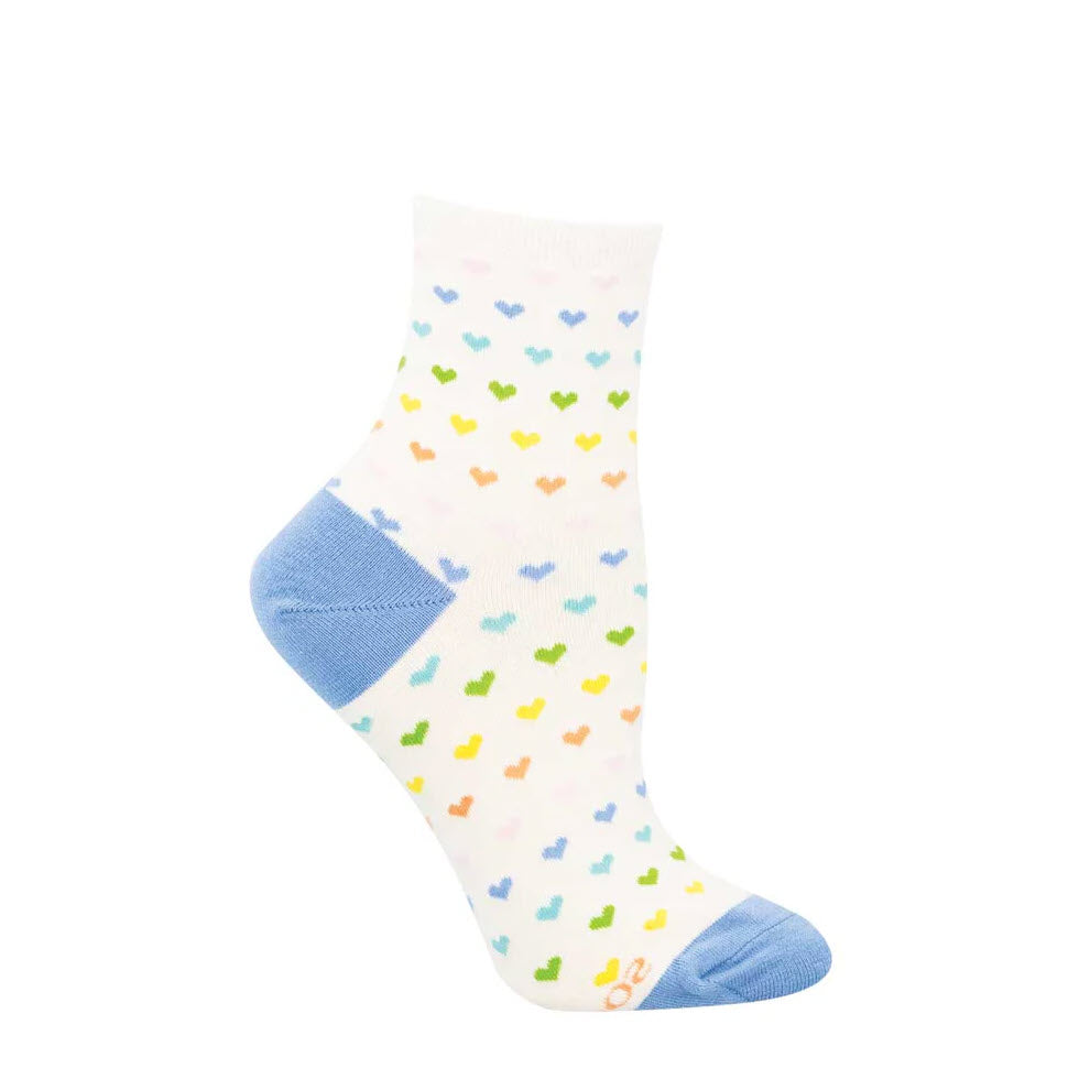 A white ankle sock with blue heel and toe accents, decorated with small, colorful heart patterns arranged in horizontal rows. The hearts are in a rainbow of colors.