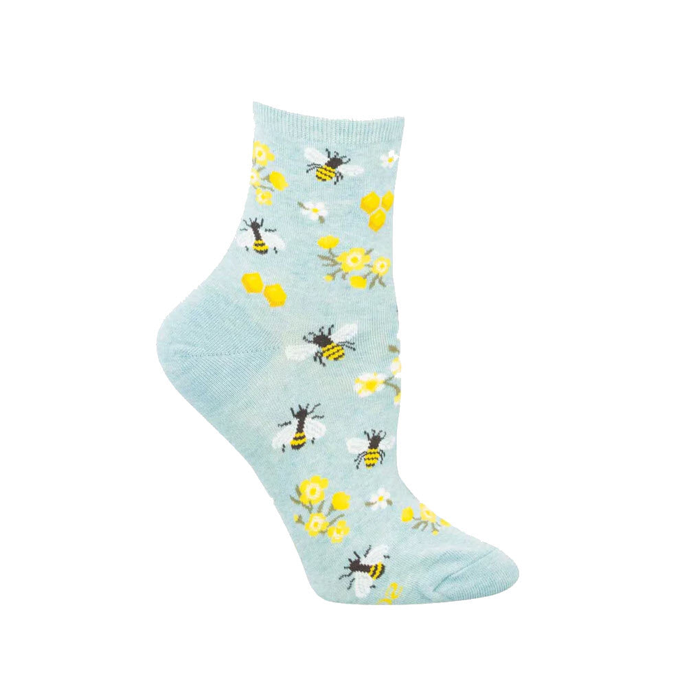 A light blue sock featuring a pattern of bees and yellow flowers scattered across the fabric.