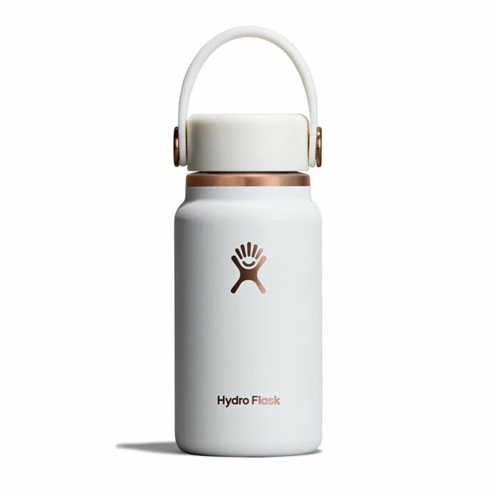 A white Hydro Flask water bottle with a copper-colored lid and handle, featuring the Hydro Flask logo and brand name on the front, set against a plain white background.