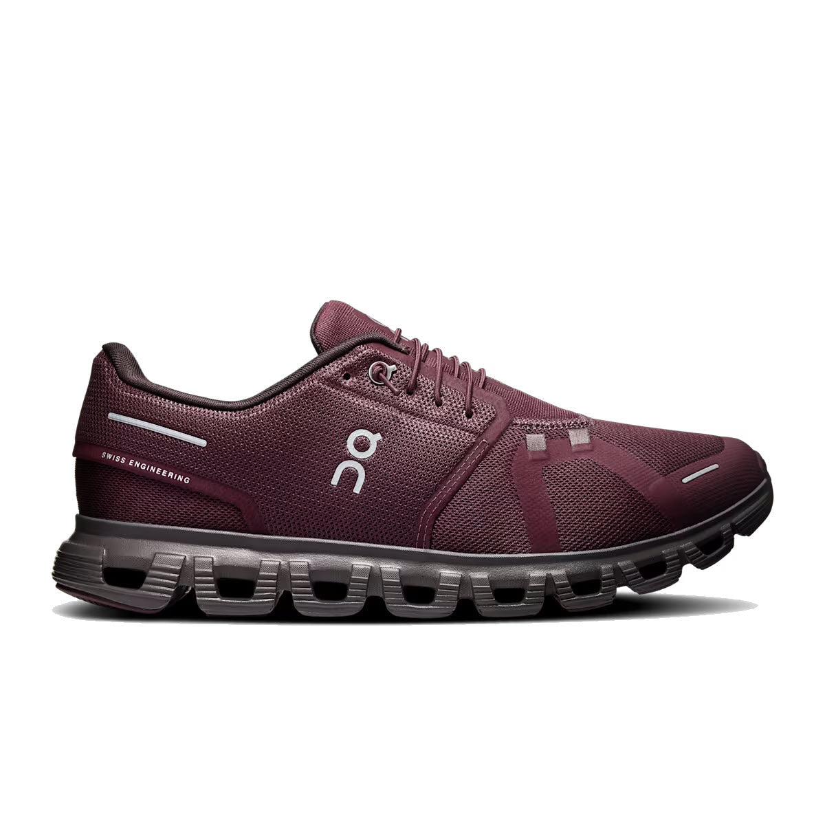 A maroon athletic sneaker with mesh upper, signature cloud-shaped sole, and white ON logo on the side. The shoe has a low-top design and sleek, modern appearance.
