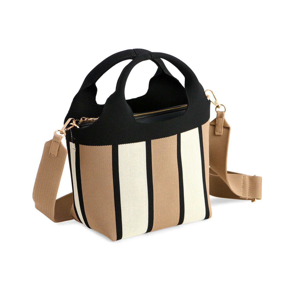 A small, structured handbag with black handles and a zippered top, featuring vertical cream and tan stripes. It has a wide, adjustable tan shoulder strap attached with gold hardware.