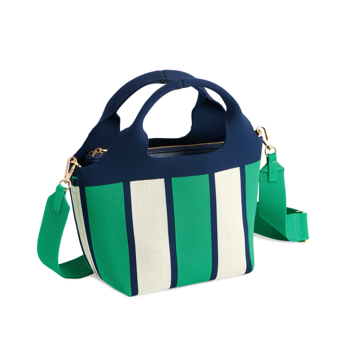 A small tote bag with navy blue, green, and white vertical stripes, featuring two short handles and a detachable green shoulder strap with gold hardware.