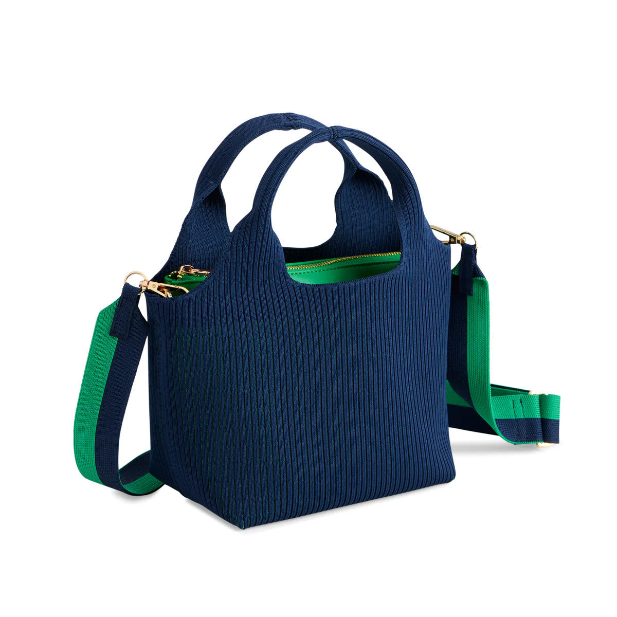 A blue textured handbag with short handles and a detachable, adjustable green and blue shoulder strap. The bag has a green zippered top and gold hardware.