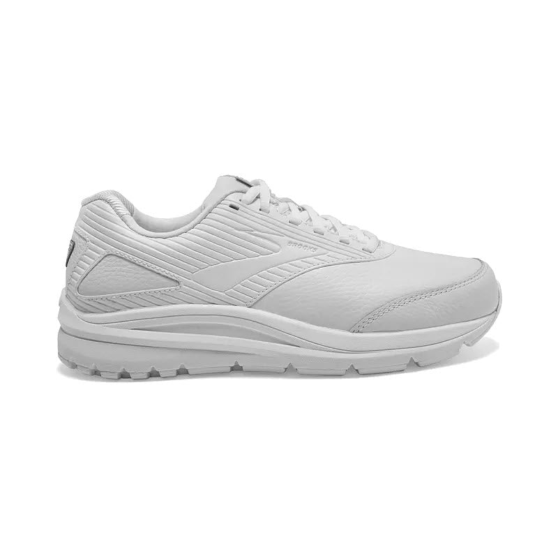 A single white Brooks Addiction Walker 2 walking shoe with a textured design and a low-profile sole, displayed on a plain white background.