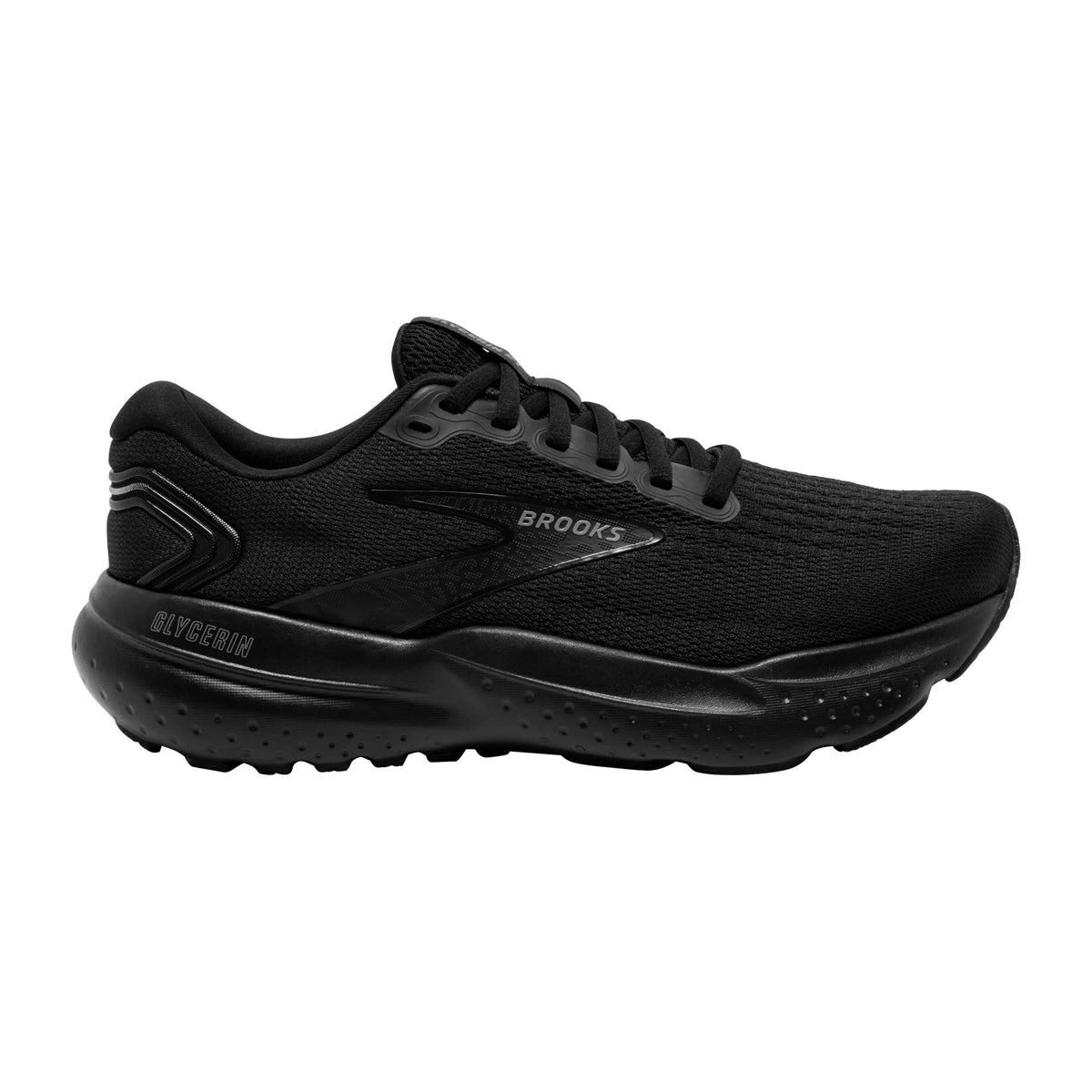 A black Brooks Glycerin 21 women&#39;s running shoe with a textured sole and visible DNA LOFT v3 cushioning, isolated on a white background.