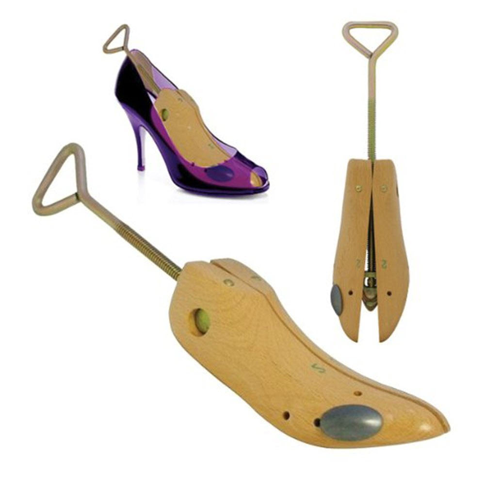 A pair of F.L. Inc FRANKFORD LEATHER WOMENS 1 PROFESSIONAL STRETCHER alongside a high-heeled shoe.