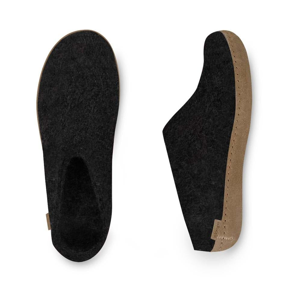 A pair of Glerups The Slip-On Leather Charcoal - Adults insoles isolated on a white background.