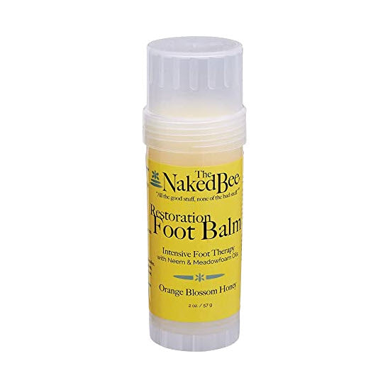 A container of the Naked Bee Foot Balm Orange Honey Restoration for dry cracked heels.