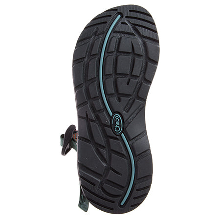Black ChacoGrip™ rubber outsole of a CHACO Z/CLOUD X2 RUNE TEAL - WOMENS shoe with traction pattern and a blue accent.