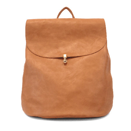 Joy Susan Colette Backpack Bourbon, a tan faux leather bag isolated on a white background.