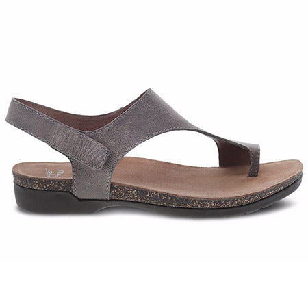 A single gray Dansko Reece Waxy Burnished Stone sandal with a strap over the instep on a white background.