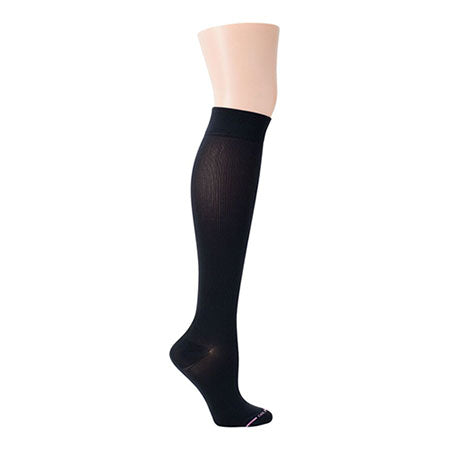 A single black DR. MOTION COMPRESSION SOCK MERIMEKKO FLOWERS BLACK displayed on a mannequin leg.