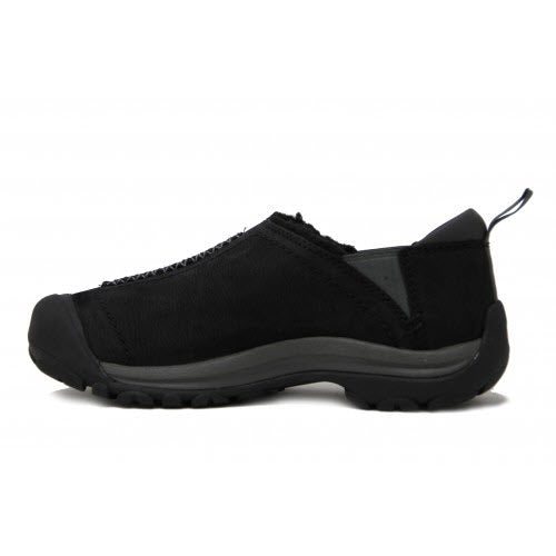 Side view of a Keen Kaci Winter black/magnet leather slip-on casual shoe with a white sole.
