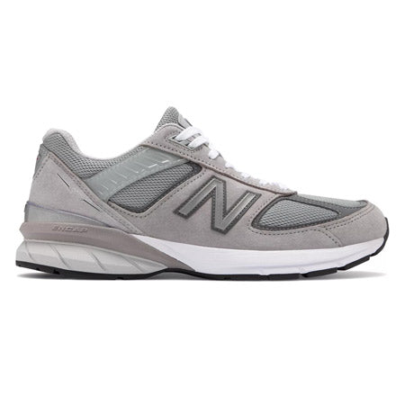 A grey New Balance 990V5 running shoe with ENCAP midsole technology isolated on a white background.